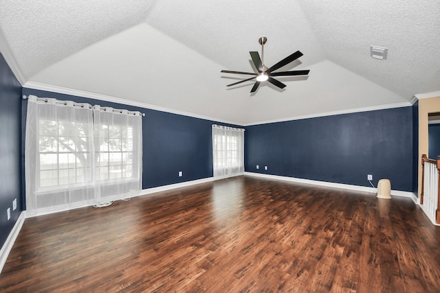 3107 Dulaney Rd, Houston, TX 77084 - unfurnished room with vaulted ceiling, a ceiling fan, a textured ceiling, and wood finished floors