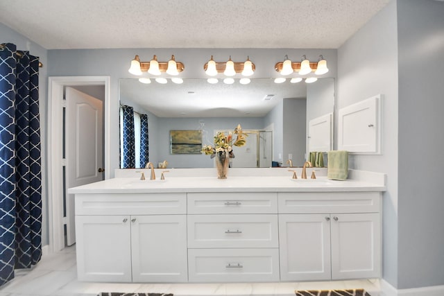 3107 Dulaney Rd, Houston, TX 77084 - bathroom featuring a textured ceiling, double vanity, and curtained shower
