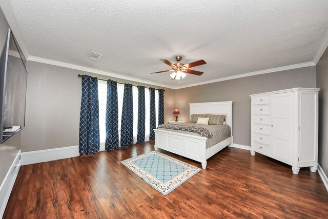 3107 Dulaney Rd, Houston, TX 77084 - bedroom with dark wood-style flooring, a textured ceiling, ornamental molding, and ceiling fan