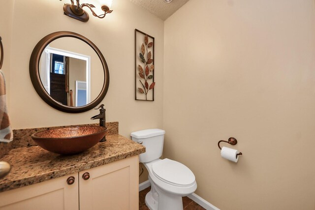 3107 Dulaney Rd, Houston, TX 77084 - half bath featuring vanity and a textured ceiling