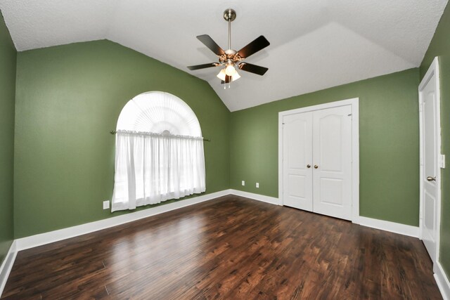 3107 Dulaney Rd, Houston, TX 77084 - unfurnished bedroom with vaulted ceiling, wood finished floors, a closet, and ceiling fan