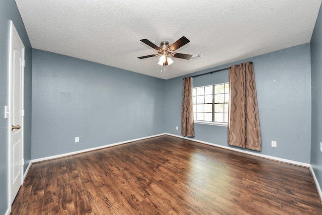 3107 Dulaney Rd, Houston, TX 77084 - spare room featuring a ceiling fan, wood finished floors, and a textured ceiling