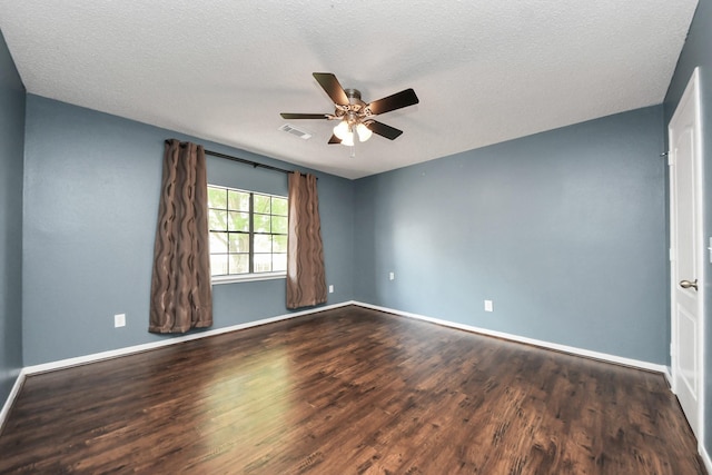 3107 Dulaney Rd, Houston, TX 77084 - spare room featuring a ceiling fan, dark wood-style flooring, and a textured ceiling