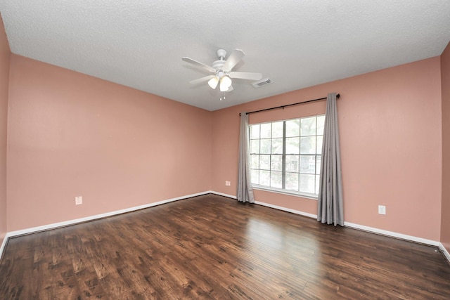 3107 Dulaney Rd, Houston, TX 77084 - empty room featuring a ceiling fan and dark wood finished floors