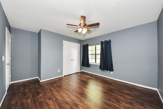 3107 Dulaney Rd, Houston, TX 77084 - empty room with a ceiling fan, wood finished floors, and a textured ceiling