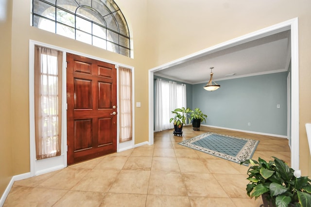 3107 Dulaney Rd, Houston, TX 77084 - entrance foyer featuring crown molding and tile patterned flooring