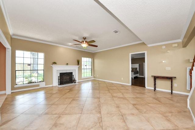 3107 Dulaney Rd, Houston, TX 77084 - unfurnished living room featuring a ceiling fan, a textured ceiling, ornamental molding, light tile patterned floors, and a fireplace