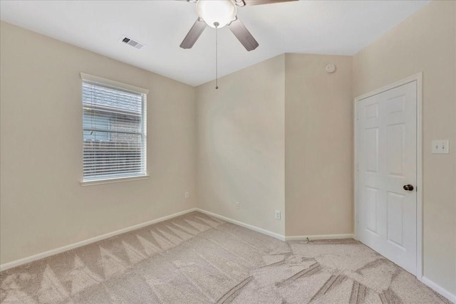 4473 Gran Canary Dr, League City, TX 77573 - empty room with light carpet, ceiling fan, and a smoke detector
