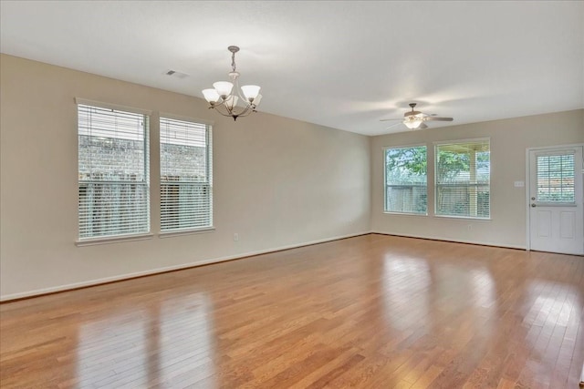 4473 Gran Canary Dr, League City, TX 77573 - spare room with a chandelier, light wood-style flooring, and ceiling fan