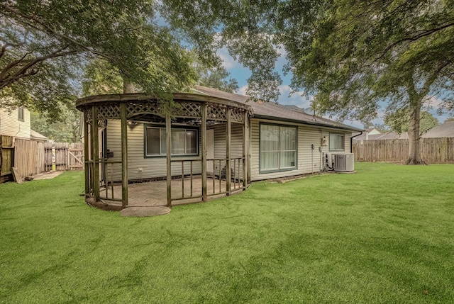 22307 Silver Morning Cir, Katy, TX 77450 - rear view of property featuring a fenced backyard and a patio area