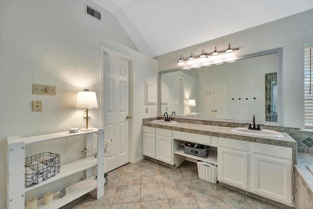 14523 Hillside Hickory Ct, Houston, TX 77062 - full bath with vaulted ceiling, double vanity, and a tub to relax in