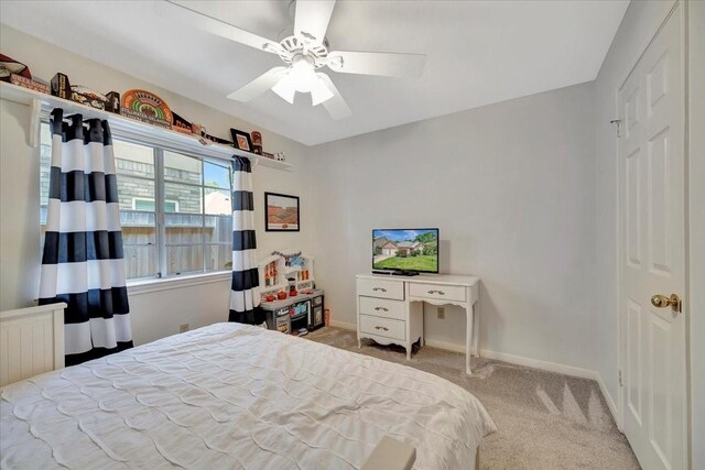 14523 Hillside Hickory Ct, Houston, TX 77062 - bedroom featuring light carpet, ceiling fan, and radiator heating unit