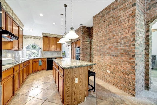 14523 Hillside Hickory Ct, Houston, TX 77062 - kitchen featuring black appliances, a center island, backsplash, brown cabinetry, and a kitchen bar