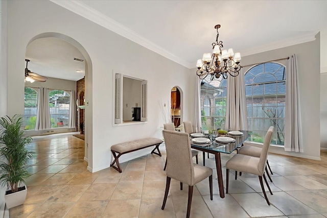 14523 Hillside Hickory Ct, Houston, TX 77062 - dining room featuring crown molding, arched walkways, a chandelier, and ceiling fan