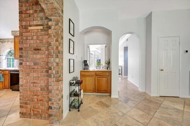 14523 Hillside Hickory Ct, Houston, TX 77062 - hallway with arched walkways and baseboards