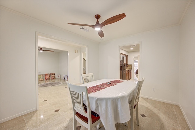 14143 Lost Meadow Ln, Houston, TX 77079 - dining area featuring a ceiling fan and crown molding