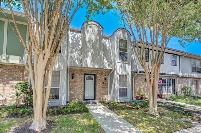 14143 Lost Meadow Ln, Houston, TX 77079 - townhome / multi-family property with brick siding