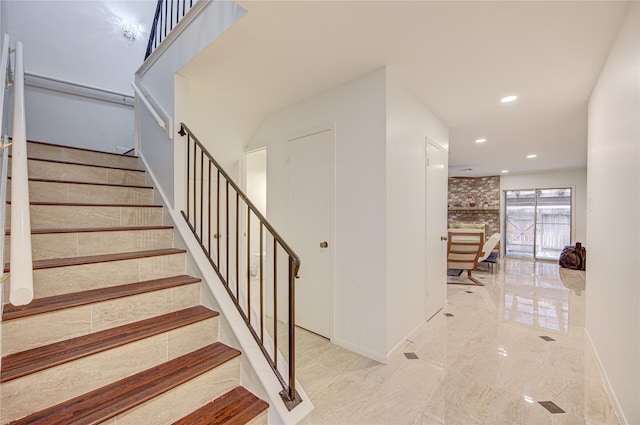 14143 Lost Meadow Ln, Houston, TX 77079 - staircase with recessed lighting and marble tiled floors