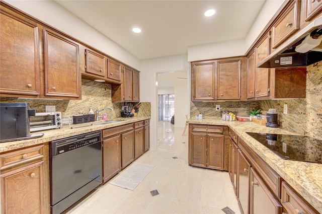 14143 Lost Meadow Ln, Houston, TX 77079 - kitchen featuring dishwashing machine, under cabinet range hood, black electric cooktop, tasteful backsplash, and recessed lighting