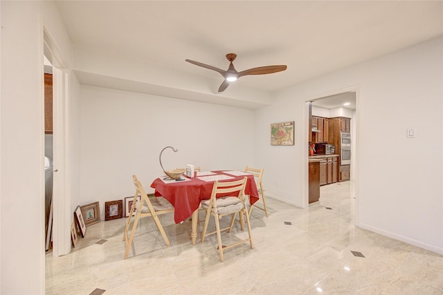 14143 Lost Meadow Ln, Houston, TX 77079 - dining area with light marble finish floors and ceiling fan