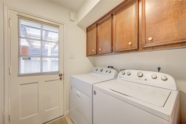 14143 Lost Meadow Ln, Houston, TX 77079 - washroom featuring independent washer and dryer and cabinet space