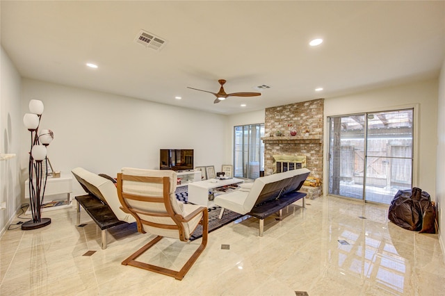 14143 Lost Meadow Ln, Houston, TX 77079 - living area featuring ceiling fan, a fireplace, and recessed lighting