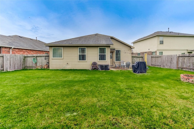 20518 Rimini River Way, Katy, TX 77449 - rear view of house featuring a fenced backyard, an outdoor fire pit, and a patio area