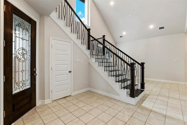 24239 Oakland Mist Ln, Katy, TX 77494 - tiled entryway featuring plenty of natural light, stairway, recessed lighting, and high vaulted ceiling