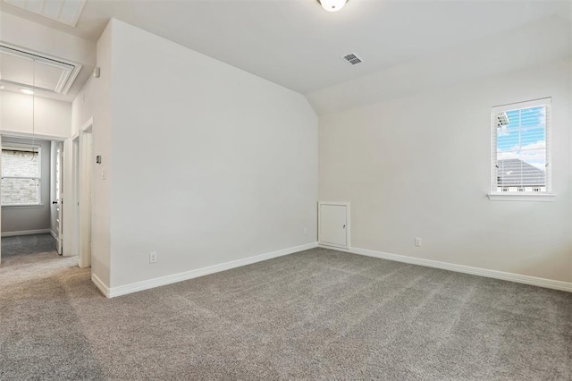 24239 Oakland Mist Ln, Katy, TX 77494 - unfurnished room featuring attic access, carpet flooring, and lofted ceiling