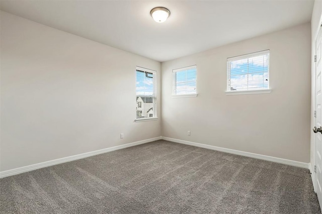 24239 Oakland Mist Ln, Katy, TX 77494 - carpeted empty room featuring baseboards