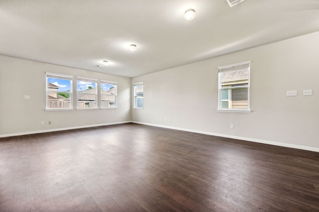3319 Atascocita Vale Dr, Humble, TX 77396 - unfurnished room featuring dark wood-type flooring and baseboards