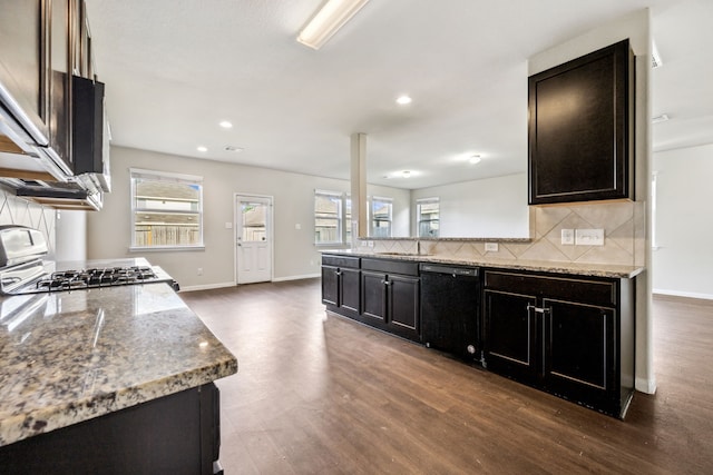 3319 Atascocita Vale Dr, Humble, TX 77396 - kitchen featuring dishwasher, stove, tasteful backsplash, dark wood-style floors, and plenty of natural light