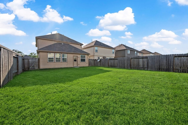 3319 Atascocita Vale Dr, Humble, TX 77396 - rear view of house with a fenced backyard