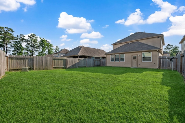 3319 Atascocita Vale Dr, Humble, TX 77396 - rear view of house with a fenced backyard