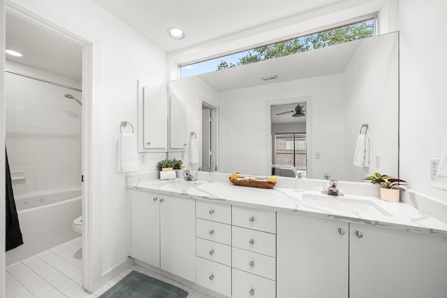 2712 La Branch St, Houston, TX 77004 - bathroom with double vanity, a ceiling fan, tile patterned floors, and shower / washtub combination