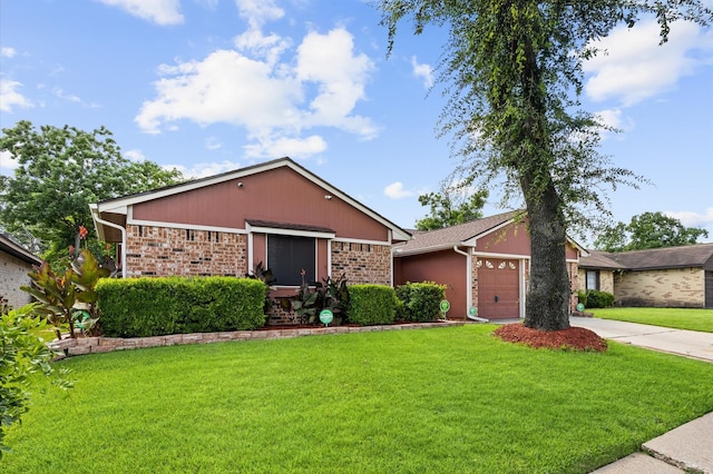 1370 Stevenage Ln, Channelview, TX 77530 - view of front of home featuring a garage, a front yard, and driveway