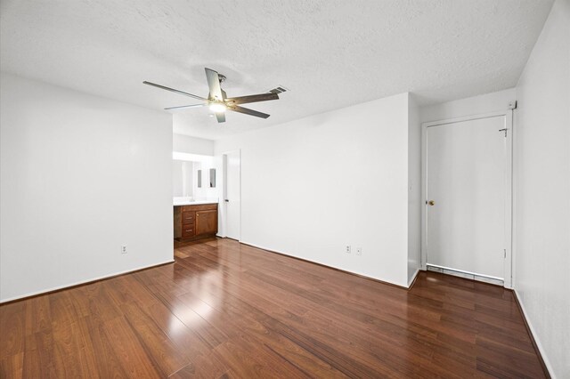 1370 Stevenage Ln, Channelview, TX 77530 - unfurnished bedroom with wood finished floors, a textured ceiling, and ceiling fan