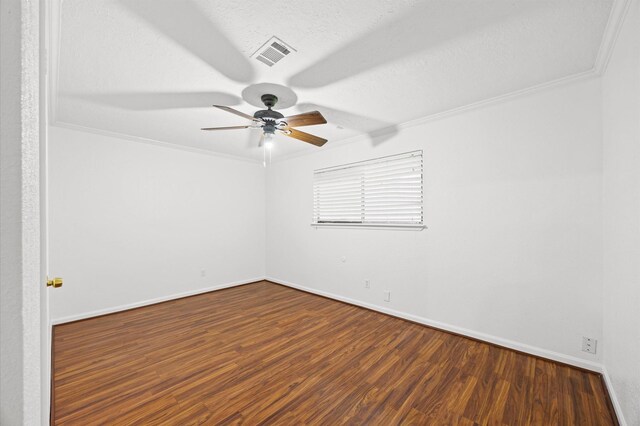 1370 Stevenage Ln, Channelview, TX 77530 - spare room with a ceiling fan, wood finished floors, and ornamental molding