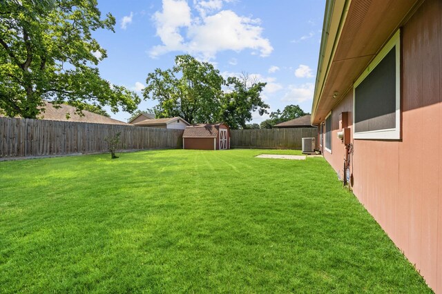 1370 Stevenage Ln, Channelview, TX 77530 - fenced backyard featuring a shed