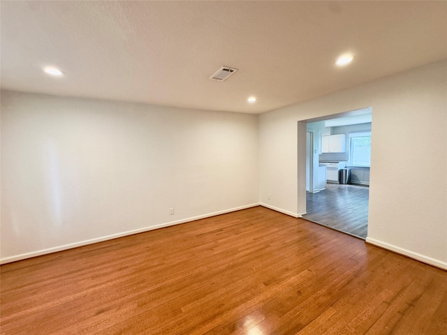 4310 Gallagher Dr, Houston, TX 77045 - unfurnished room featuring wood finished floors and recessed lighting