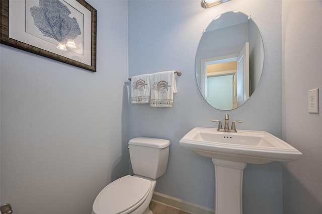 19547 Stetson Heights Ln, Richmond, TX 77407 - half bath featuring toilet and tile patterned floors
