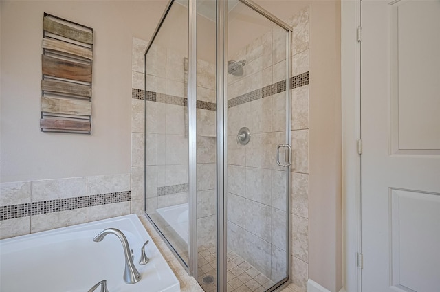 19547 Stetson Heights Ln, Richmond, TX 77407 - full bathroom with a garden tub, a stall shower, and radiator heating unit