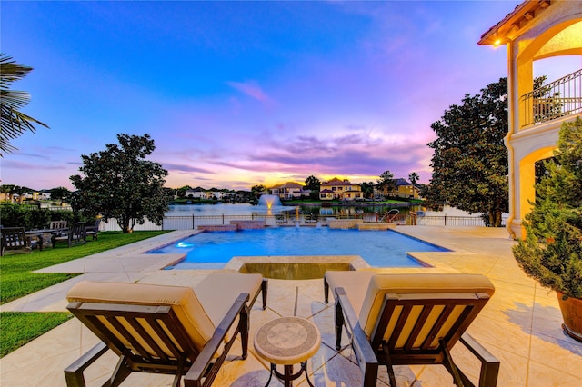7615 San Clemente Point Ct, Katy, TX 77494 - view of pool with a patio, a pool with connected hot tub, and a water view