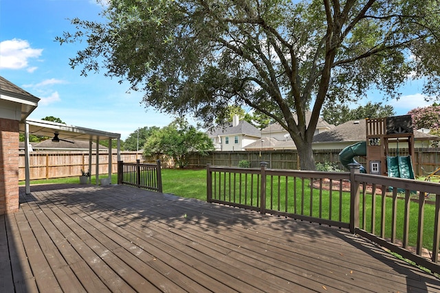 23010 Adwick Ct, Katy, TX 77450 - wooden deck with a playground and a fenced backyard