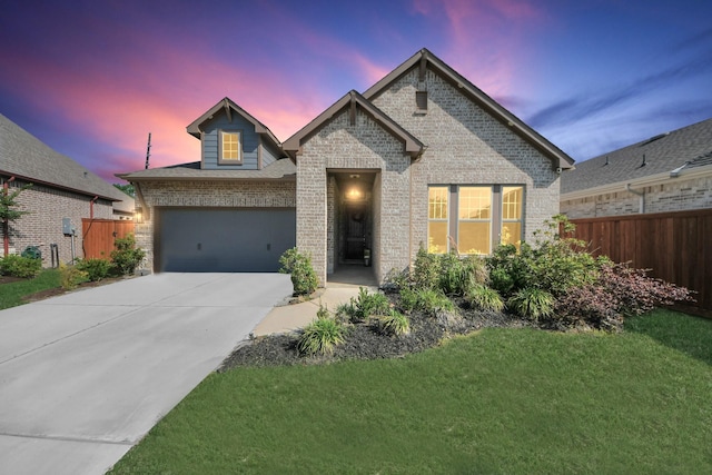 18334 Sunset Elm Dr, Cypress, TX 77433 - view of front of home featuring brick siding, driveway, and an attached garage