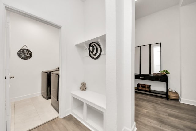 18334 Sunset Elm Dr, Cypress, TX 77433 - mudroom with washer and dryer and wood finished floors
