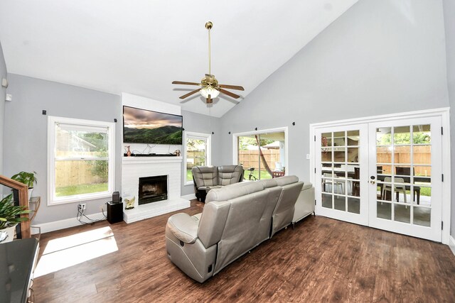 7726 Sorbete Dr, Houston, TX 77083 - living area with a ceiling fan, wood finished floors, high vaulted ceiling, a fireplace, and french doors