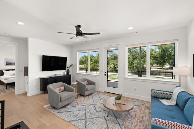 946 Euel Moore Dr, Kingsland, TX 78639 - living area with light wood-style flooring, recessed lighting, and a ceiling fan