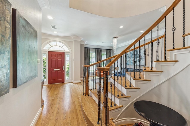 3926 Oberlin St, West University Place, TX 77005 - entryway featuring ornamental molding, light wood-style floors, recessed lighting, and stairway