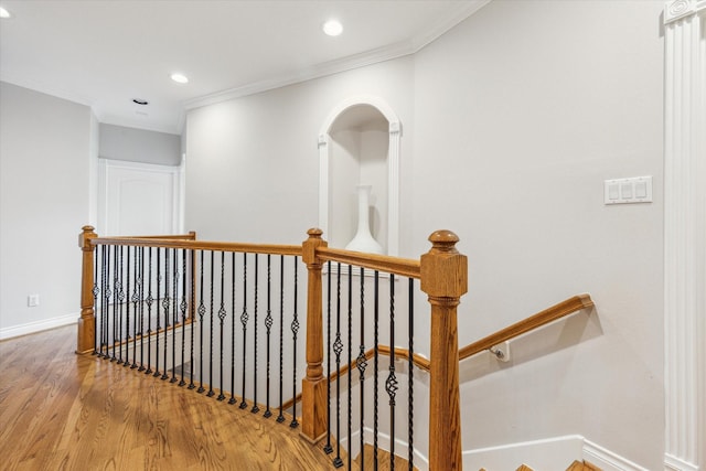 3926 Oberlin St, West University Place, TX 77005 - staircase featuring wood finished floors, crown molding, and recessed lighting